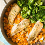 Skillet Chicken, Veggies and Sweet Potatoes with Creamy Light Garlic Sauce.