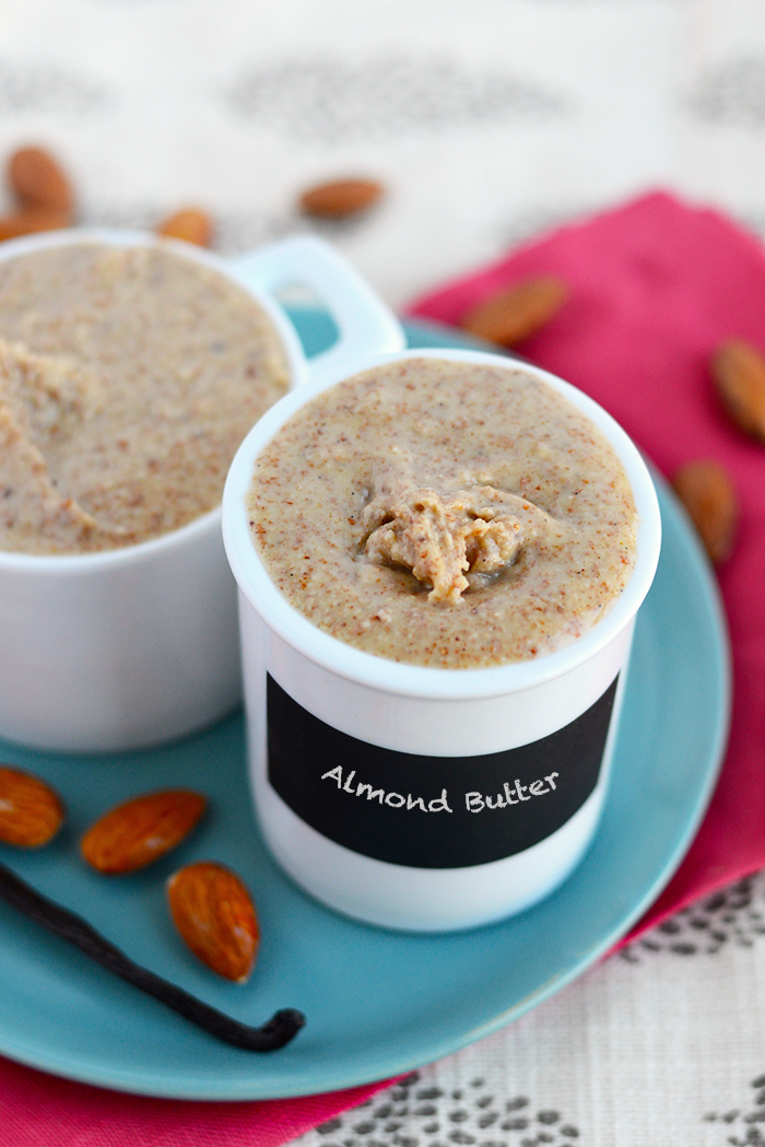 Make your own vanilla bean almond butter with just a few whole ingredients and a food processor. No additives involved or refined sugars!