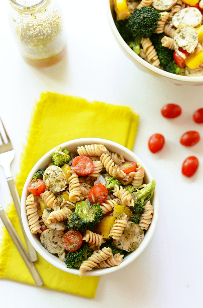 Make this quinoa pasta salad with seasonal veggies, homemade Italian dressing, and tons of spices for a delicious summertime salad that doubles as dinner!