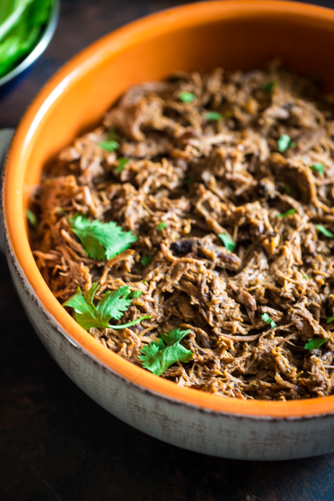 This tender, paleo slow cooker roast beef is mixed with pumpkin and salsa and then shredded! It's perfect in tacos or on a salad for a healthy, weeknight meal, that is full of fall flavor!