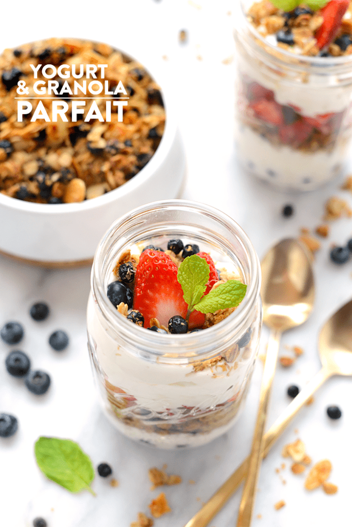 Yogurt and Granola Parfait - Layer up Greek yogurt, fresh berries, and your favorite homemade granola for the simplest mason jar parfait breakfast!"