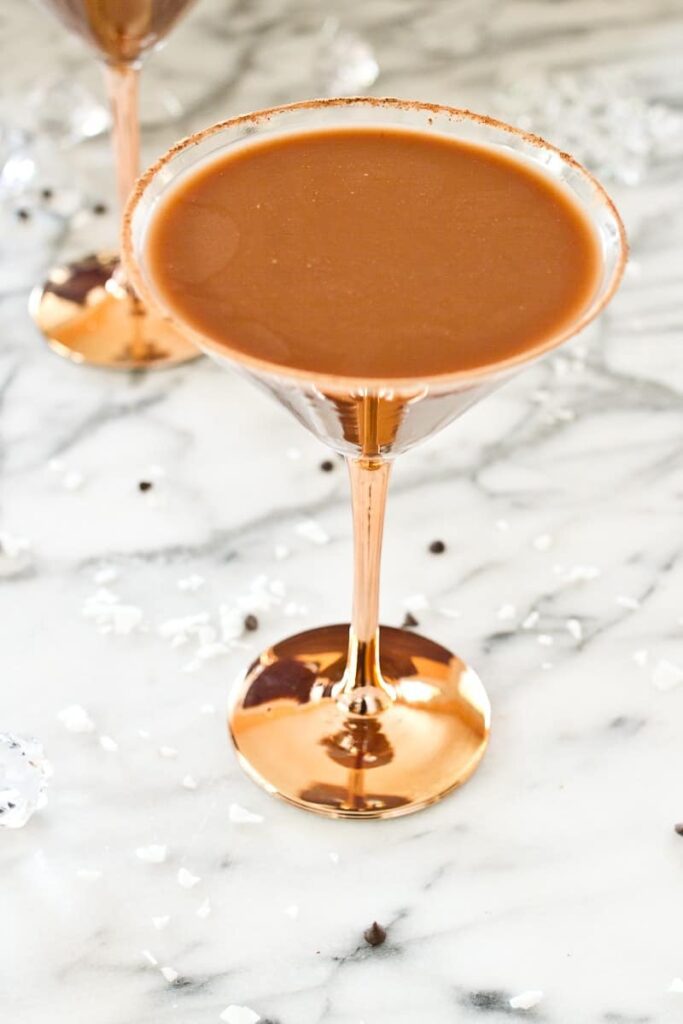 This Hooville Martini is a rich and nutty cocktail featuring chocolate coconut water, vodka and a splash of amaretto. It's perfect for holiday parties and a tad healthier since it's made with coconut water.