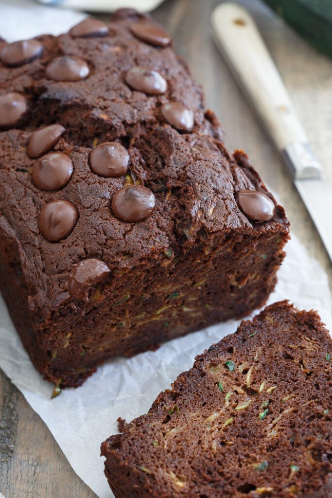 This paleo chocolate zucchini bread is actually flourless which makes it super moist. It's healthy yet decadent way to enjoy the end of summer zucchini surplus and a great back to school snack.