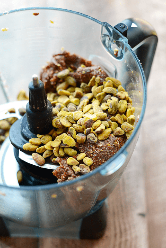 Give the gift of homemade this holiday season and layer up the ingredients for these delicious Cherry Pistachio Energy Balls in a your favorite mason jar!