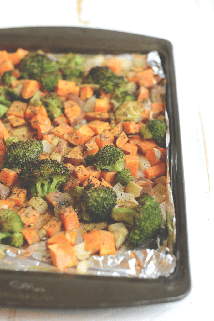 Vegetarian Brown Rice Bowl with roasted veggies, hummus, hemp seeds, and sprouts!