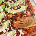 mexican quinoa and sweet potato casserole with chipotle yogurt sauce