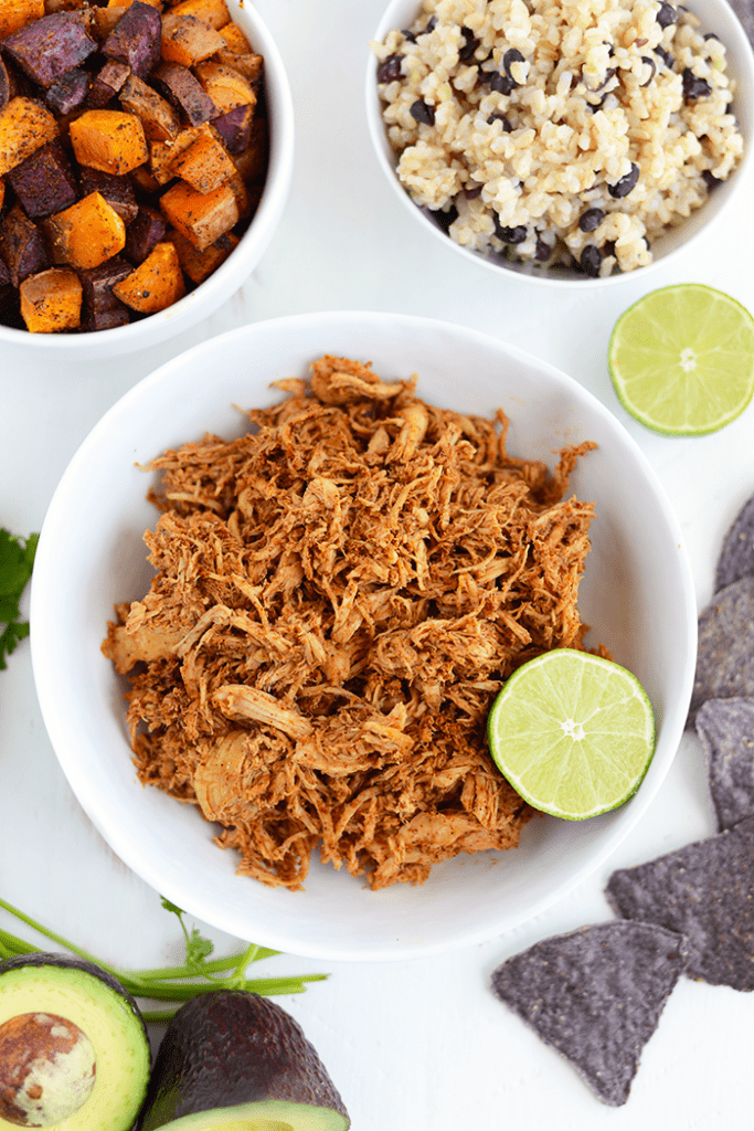 Make these clean eating crock-pot chicken taco bowls at the beginning of the week to meal prep for the days to come! It's gluten and preservative free!