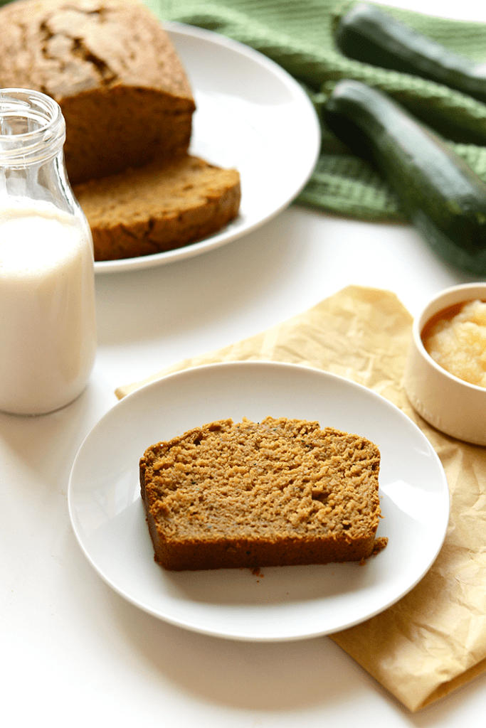 Have too many zucchinis in the garden? Make yourself some delicious coconut oil zucchini bread made with 100% whole grains and no butter!