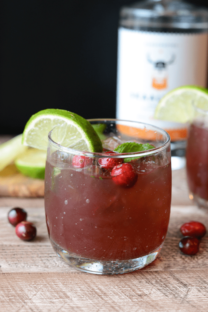 Get festive this winter and make these delicious and refreshing Cranberry Mojitos! They're made with all the classic mint mojito flavors with a splash of cranberry juice.