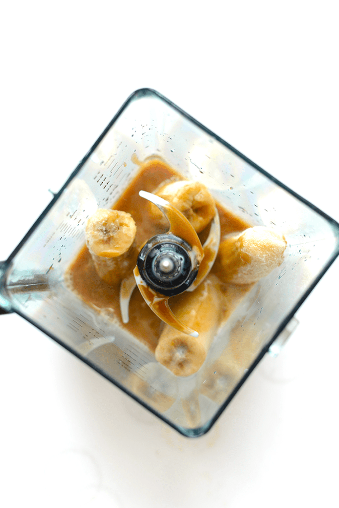 Have your coffee and breakfast too! Make this salted caramel frappe for a delicious, paleo-friendly breakfast made with frozen banana, coffee, and homemade caramel!