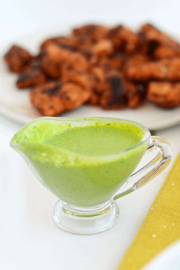 This Sriracha Chicken Salad is packed with veggies and blue cheese. It's topped with a homemade green goddess dressing that's made with a Greek yogurt base!