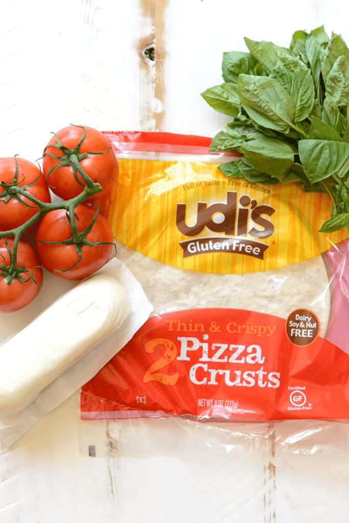 Got 20 minutes? Make this delicious and flavorful gluten free margherita pizza with just a few ingredients for a yummy weeknight dinner!