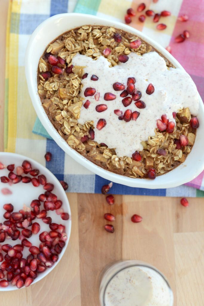 Apple Cinnamon Baked Oatmeal with Pomegranates and Cinnamon Leche Sauce