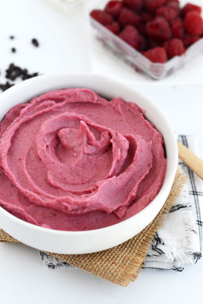 There's nothing better than a 5 minute dessert that is both vegan and paleo friendly. Make this Raspberry Banana Soft Serve with Chocolate Swirl for a guilt-free treat!