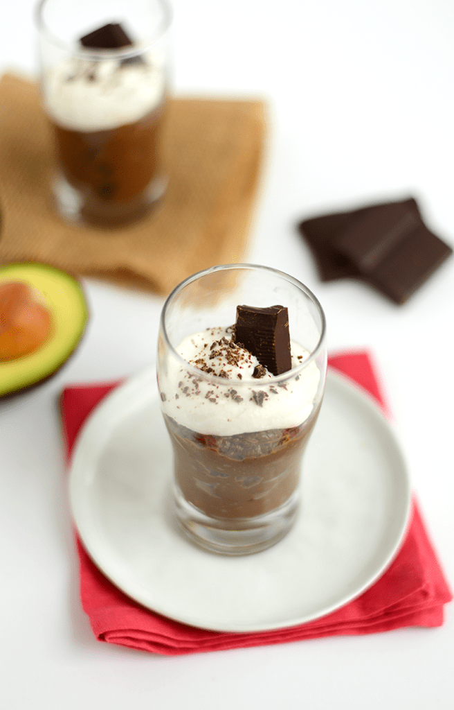 This Paleo Salted Dark Chocolate Mousse is made with an avocado and coconut base, sweetened with maple syrup, and topped off with Himalayan Sea Salt!