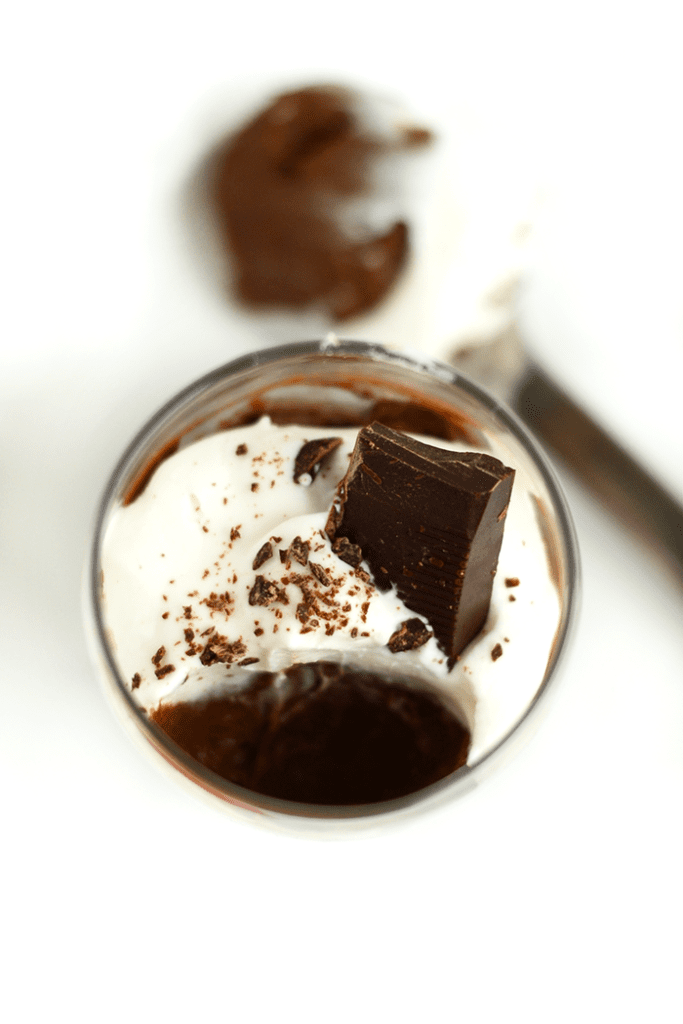 This Paleo Salted Dark Chocolate Mousse is made with an avocado and coconut base, sweetened with maple syrup, and topped off with Himalayan Sea Salt!