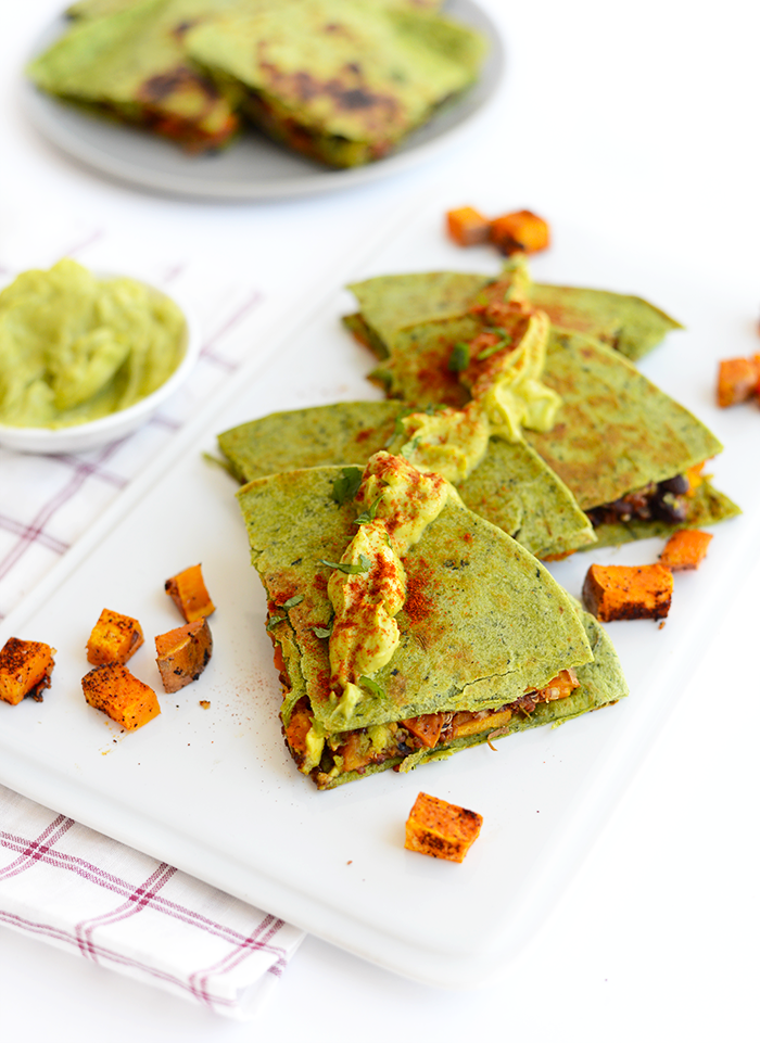 Make these cheese-free vegan sweet potato quesadillas that are packed with protein and flavor and topped with a delicious cilantro avocado spread!