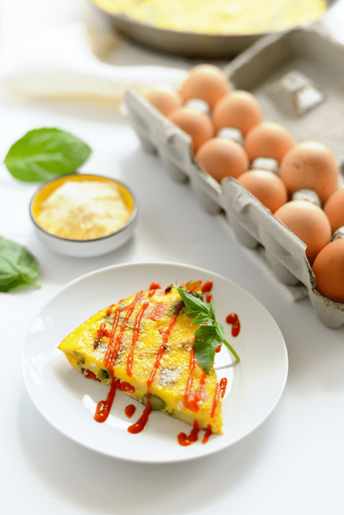 Got a bunch of veggies in the fridge? Make yourself a delicious and colorful vegetable frittata with farm fresh eggs and a sprinkle of parmesan cheese for a healthy, low-carb breakfast option!