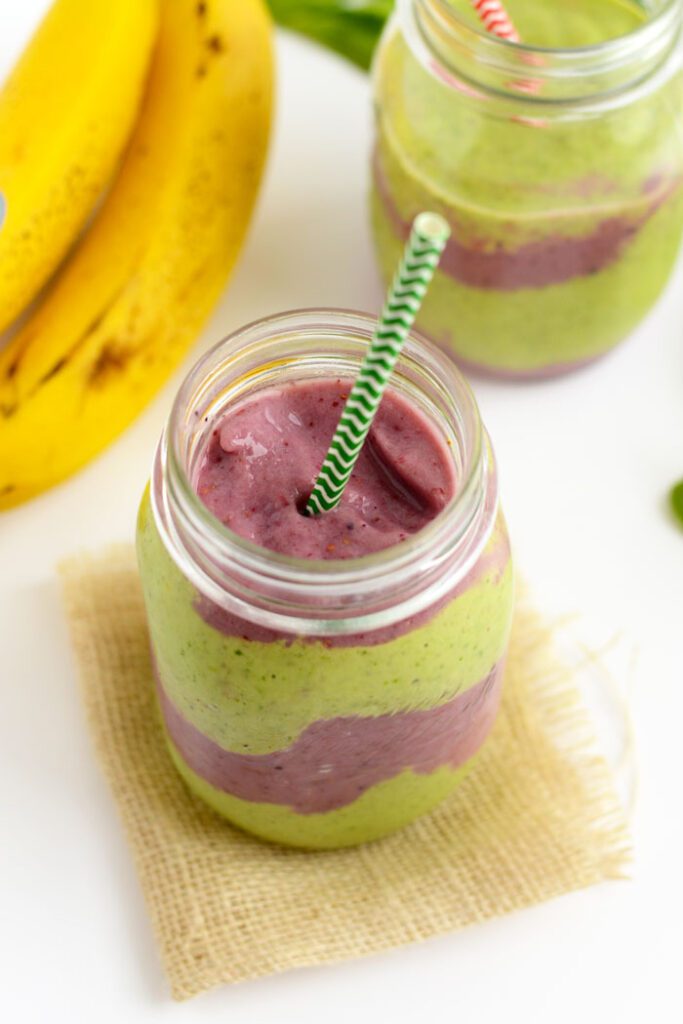 Make this berry green layered smoothie for breakfast or a snack! It’s jam packed with fruit and antioxidants and the best part is, you get 2 flavors in one! 