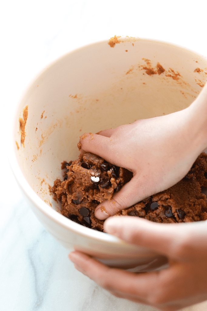 These healthier chocolate chip cookie bars are made with an almond butter base and are paleo-friendly! Did I mention they're epically gooey and irresistible?