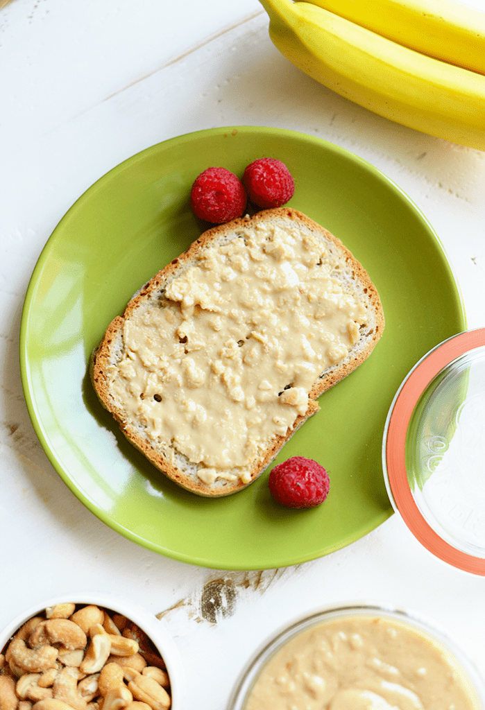 Make your own crunchy cashew butter with just a few simple ingredients, a food processor, and 10 minutes! No added sugar or additives involved!