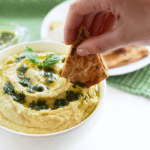 Got 5 minutes? Make this healthy lemon garlic hummus and pair it with whole wheat pita bread for a delicious fiber-filled snack!