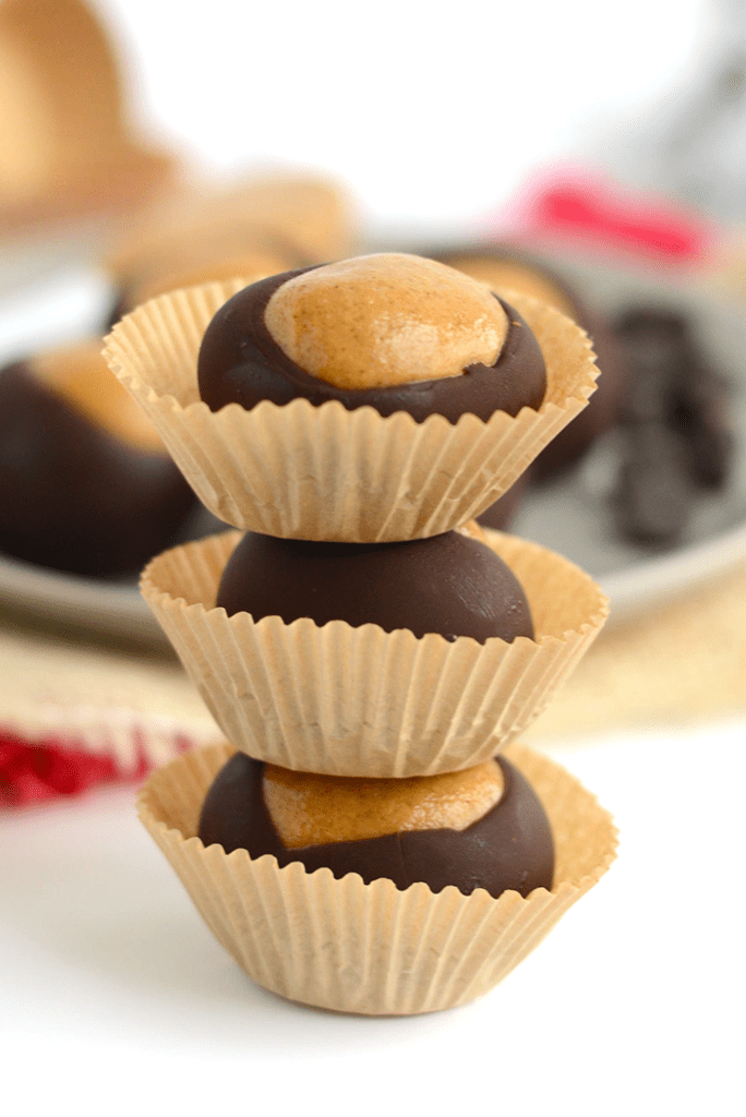 Healthy Protein Buckeyes. Is it real? Sure! Make the traditional buckeye recipe an update with protein powder as well as sugaring it with honey for a delicious dessert!