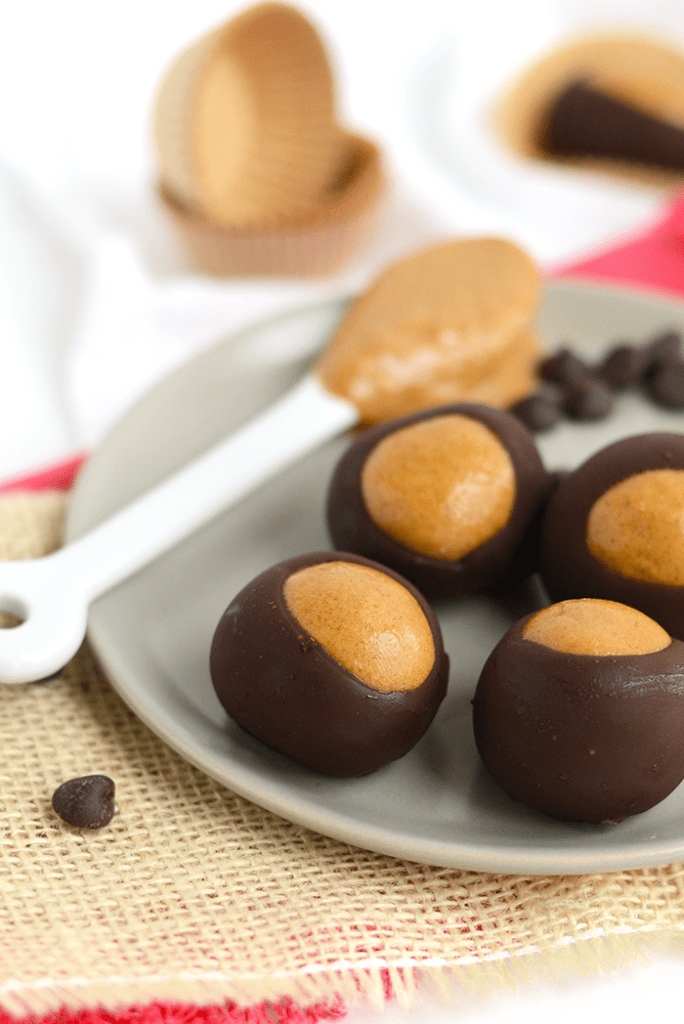 Healthy Protein Buckeyes. Is it real? Sure! Make the traditional buckeye recipe an update with protein powder as well as sugaring it with honey for a delicious dessert!