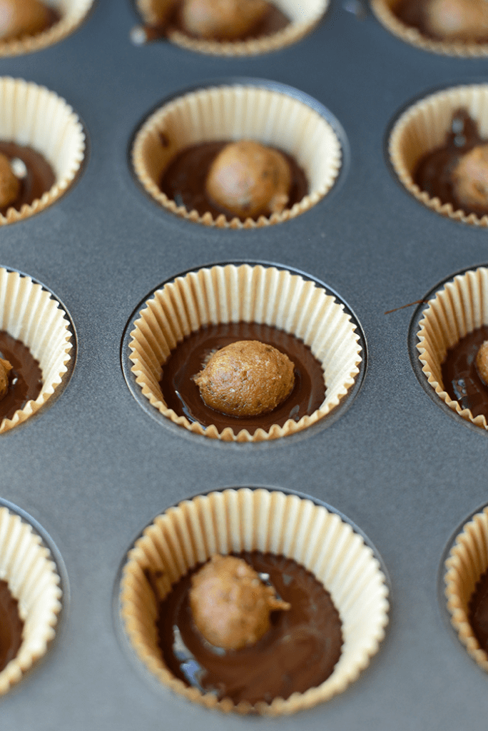 Healthy Salted Caramel Cups, it's a real thing! All you need are 4 simple ingredients to make this decadent dessert that's paleo and vegan-friendly!